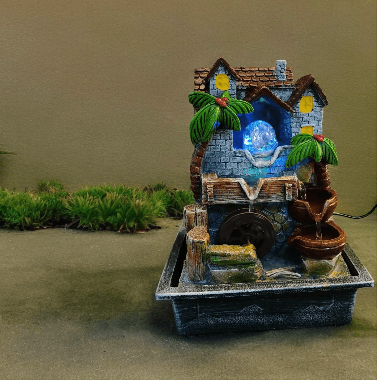 Nature-Inspired Crystal Ball Water Fountain with Hut and Wheel Accents