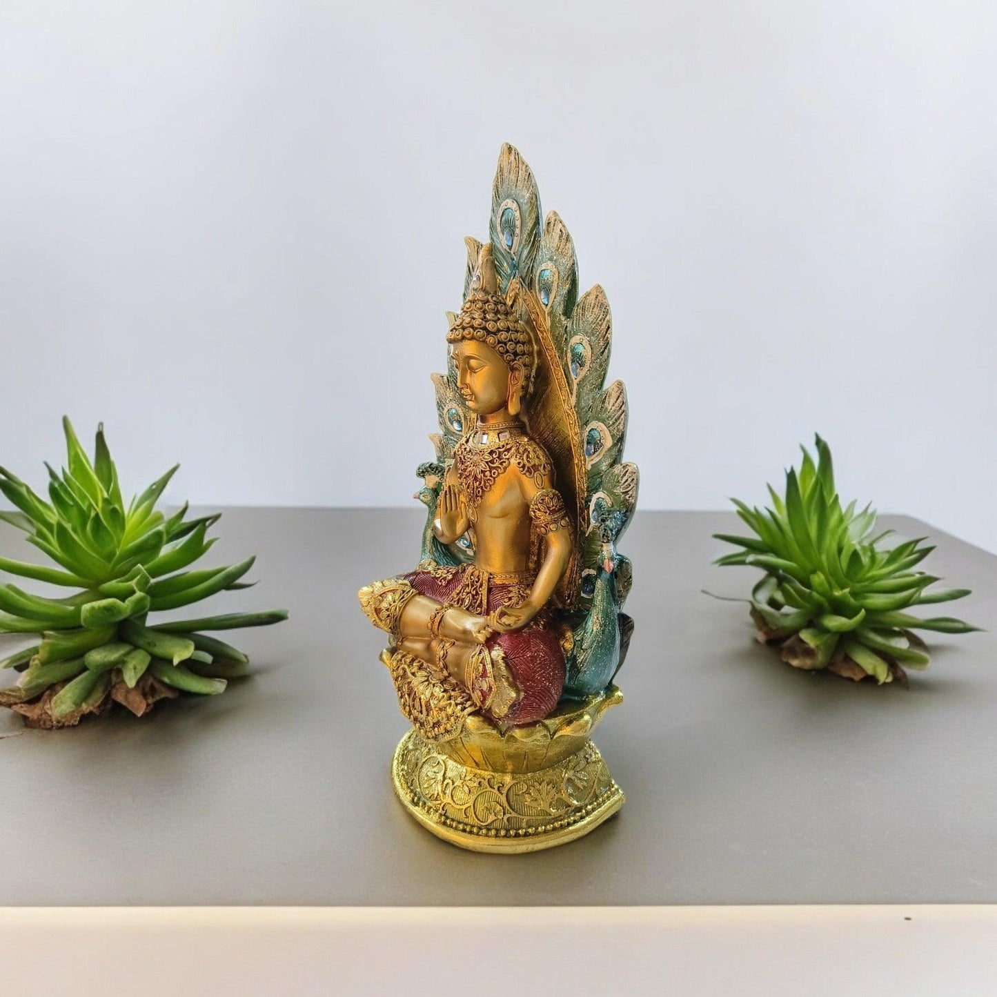 Gautam Buddha Statue sitting on Peacock