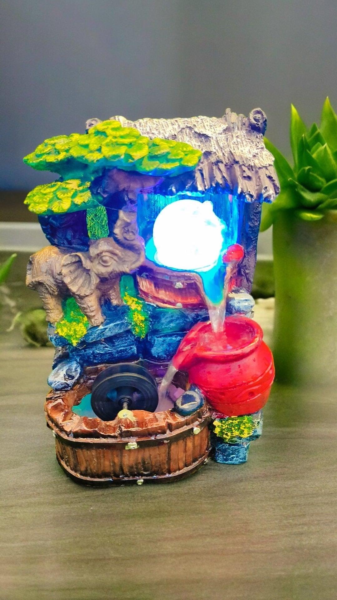 Enchanting Nature Water Fountain with Climbing Elephant and Crystal Ball