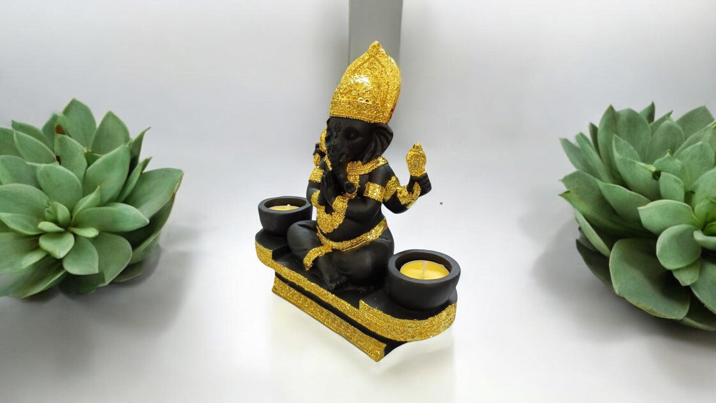 Black Lord Ganesha statue with luxurious gold-plated accents.