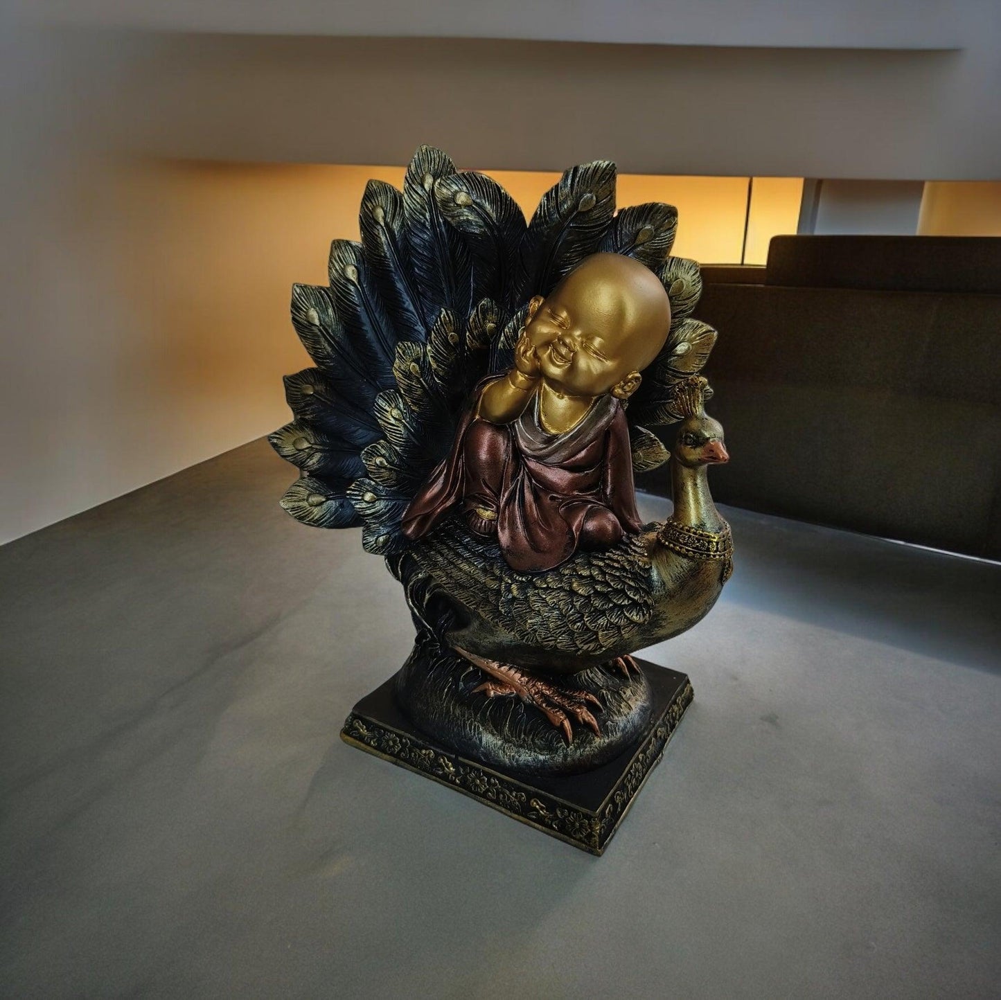 Baby Monk on Peacock Polyresin Statue
