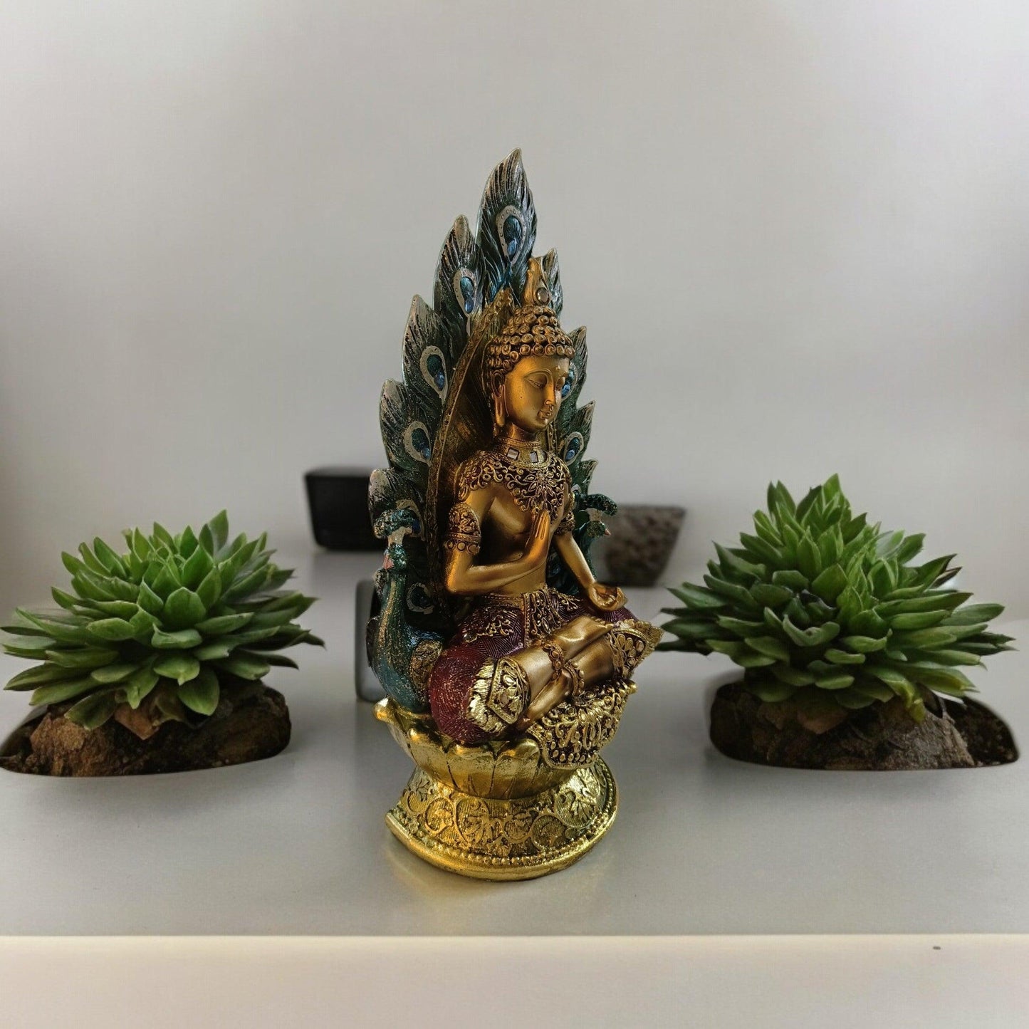 Gautam Buddha Statue sitting on Peacock