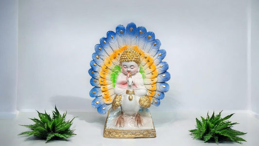 Baby Monk with Peacock statue