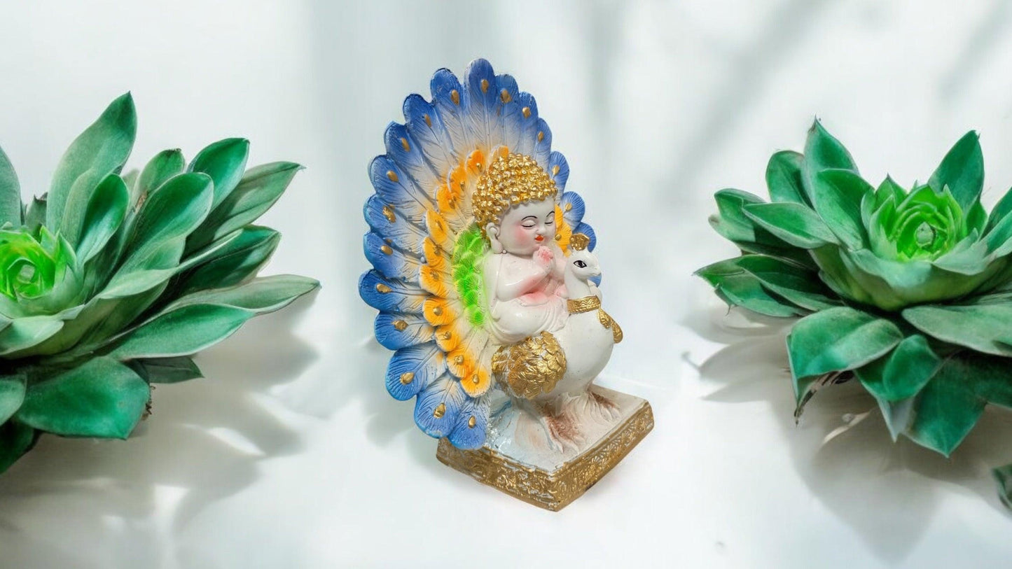 Baby Monk with Peacock statue