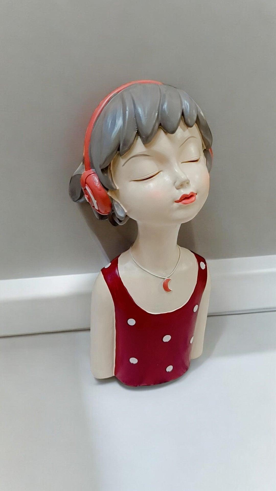 Lady Figure with Headphones