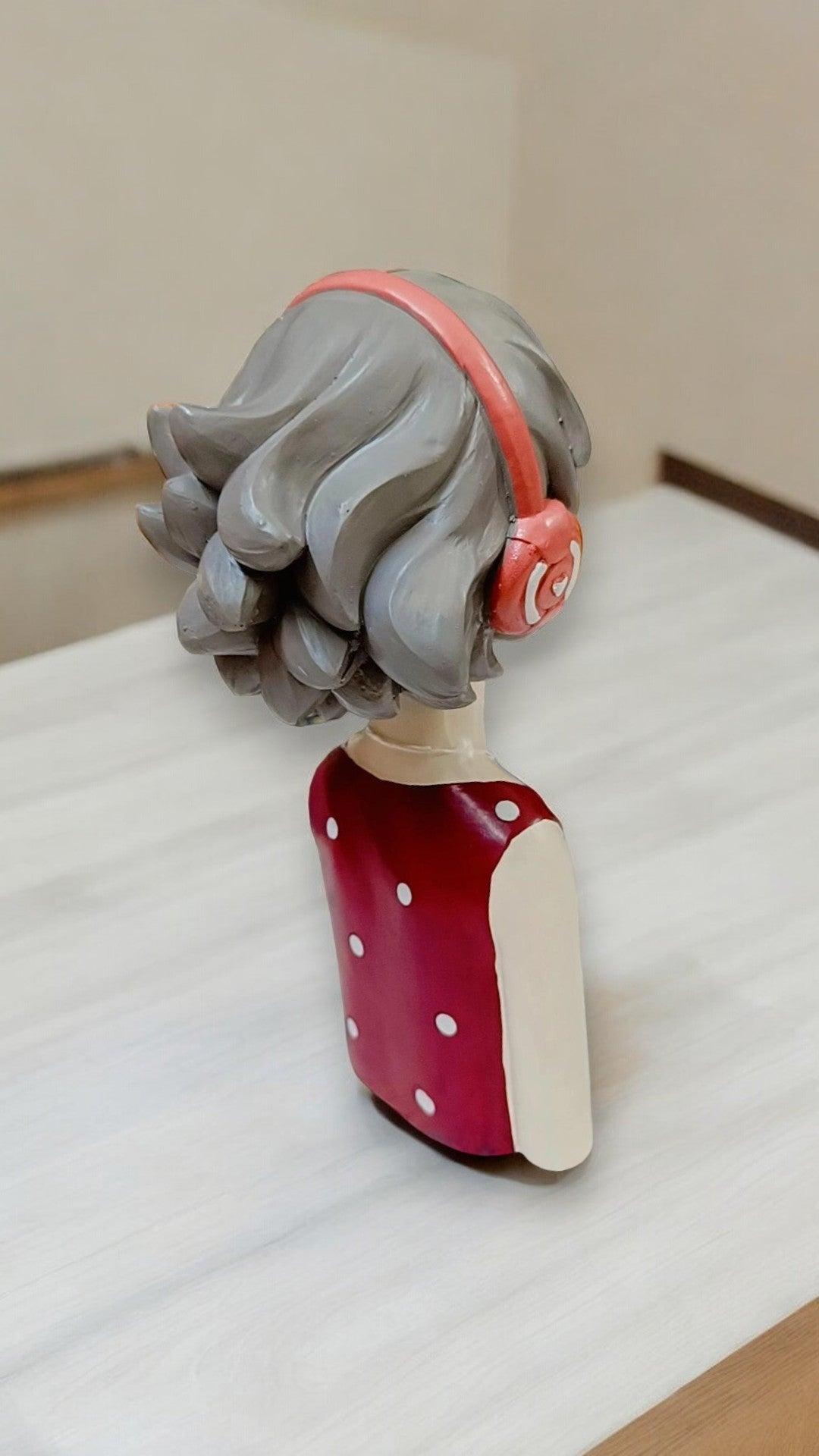 Lady Figure with Headphones