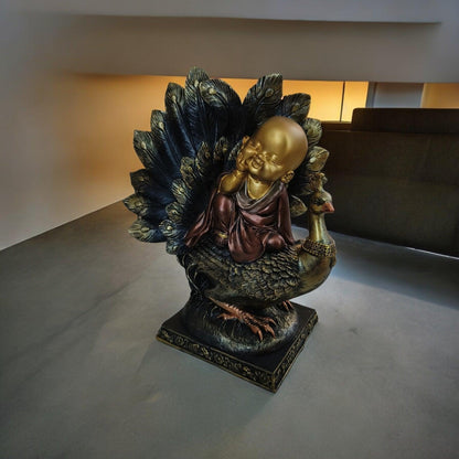 Baby Monk on Peacock Polyresin Statue