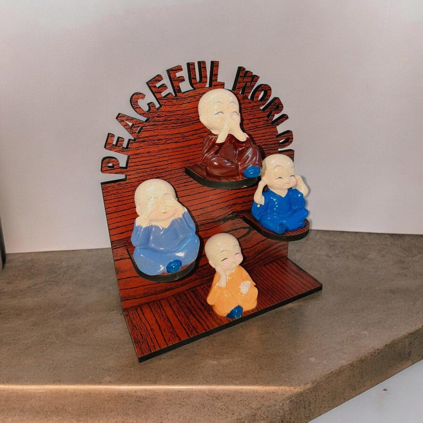 Cute Baby Monk on Wooden Base